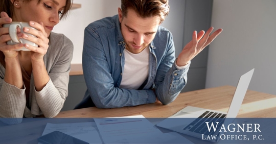 Man and woman at table.