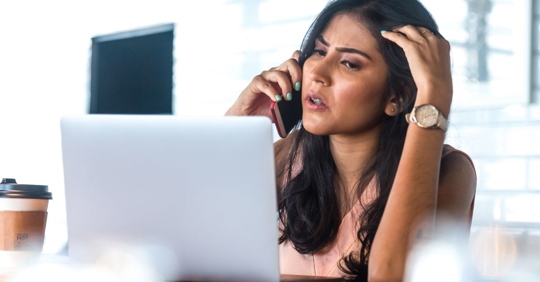 stressed woman on the phone